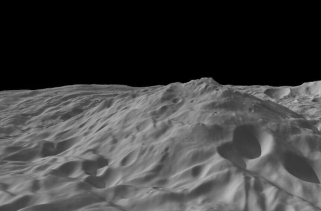 Dieses Bild des Asteroiden Vesta hat ein Computer aus Aufnahmen der Raumsonde Dawn berechnet. Es zeigt den Himmelskörper, als sei er flach. Würde man auf dem Asteroiden stehen, könnte man die Landschaft im Hintergrund nicht sehen, weil sie hinter dem Horizont läge. Einige der Klippen und Berge auf Vesta sind viele Kilometer hoch.