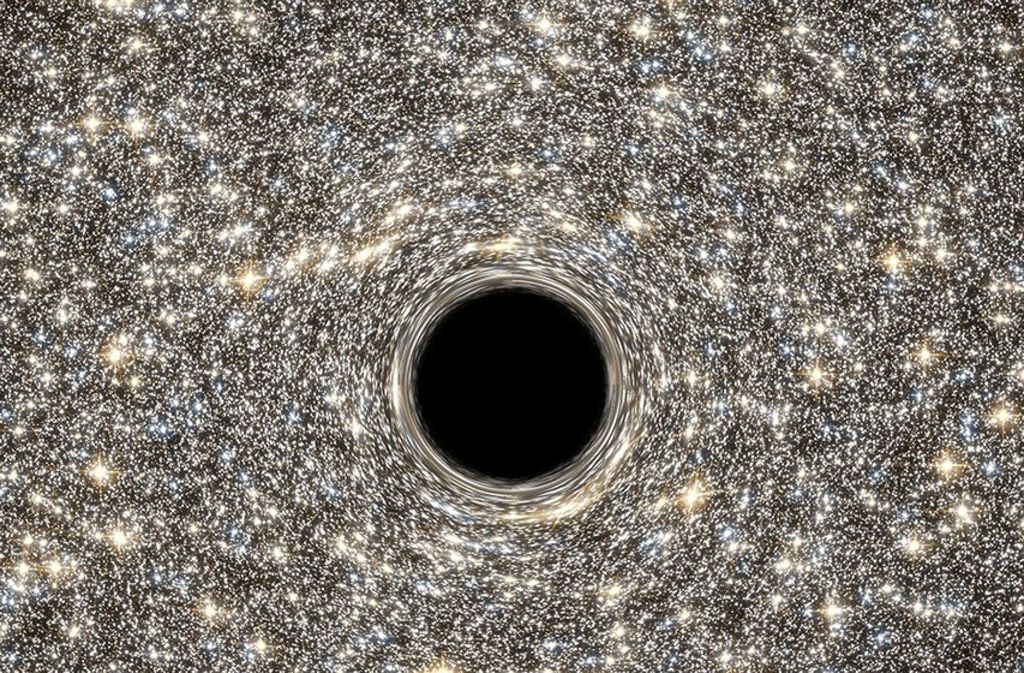 Der helle Ring stellt Gas und Staub dar, die von dem Schwarzen Loch extrem beschleunigt und schließlich mitgerissen werden.