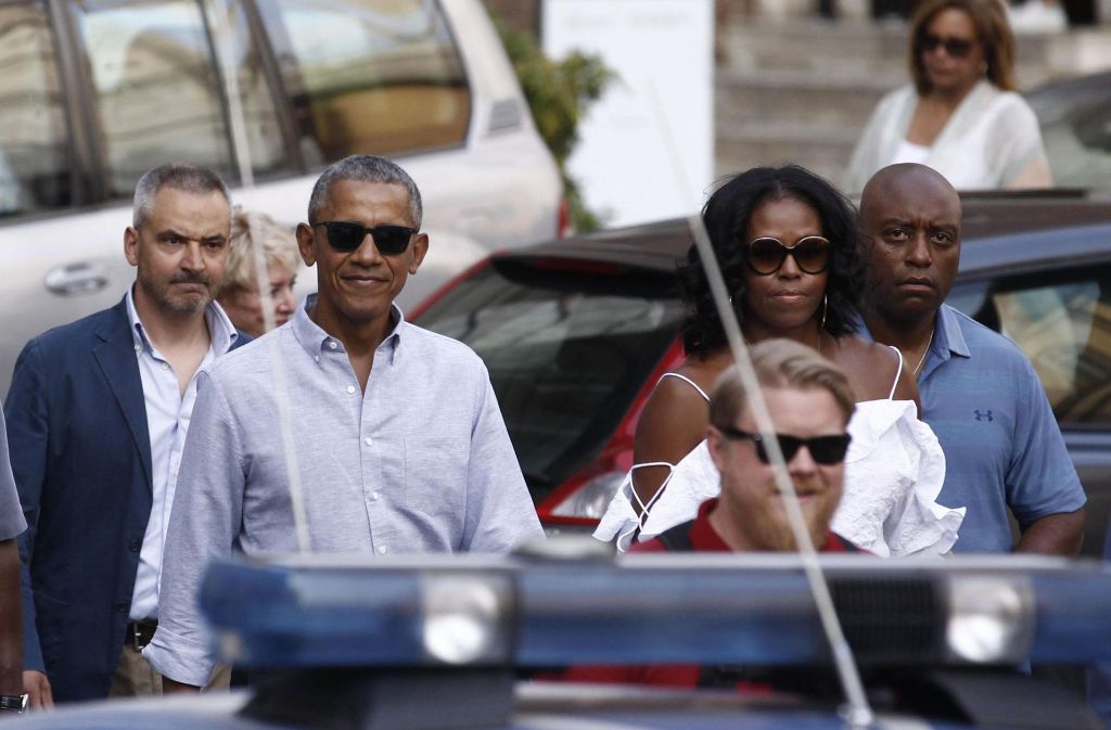 Barack Obama und seine Frau Michelle beim Sparziergang durch die Innenstadt von Siena.