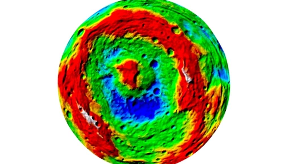  Der Himmelskörper Vesta hat gigantische Einschläge überstanden, wie Bilder von riesigen Kratern, hohen Bergen und tiefen Rinnen zeigen. 