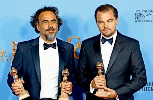 Alejandro Inárritu (li.) und sein Star Leonardo Leonardo DiCaprio mit drei Globes Foto: Getty