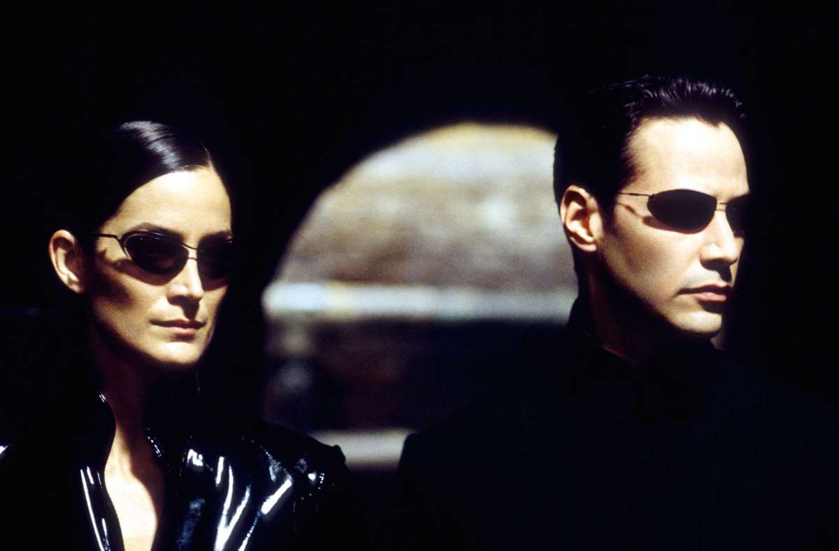 Carrie-Anne Moss als Trinity, Keanu Reeves als Neo