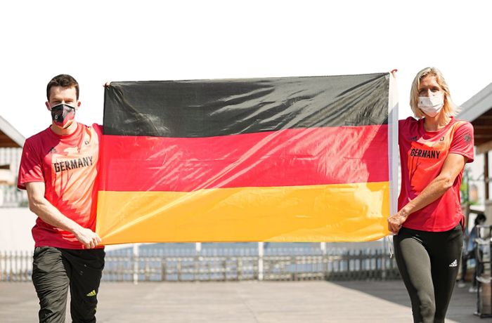 Laura Ludwig und Patrick Hausding  – zwei Stars zeigen Flagge