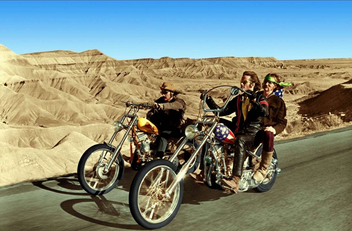 Der Chopper von Peter Fonda (Mitte) aus dem Film „Easy Rider“ kam 2014 unter den Hammer und brachte 1,2 Millionen Euro. Dem Auktionshaus zufolge ein Rekord für Zweiräder.