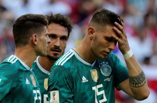Fassungslos: Mario Gomez, Mats Hummels und Niklas Süle nach dem Aus gegen Südkorea Foto: dpa