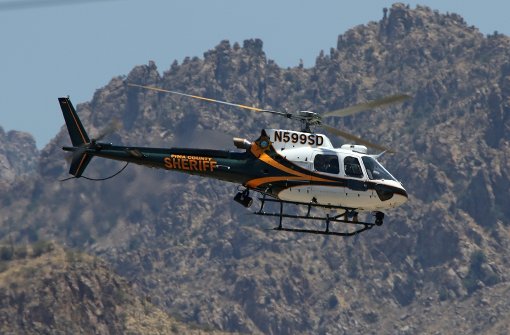 Mit Helikoptern wird nach dem vermissten deutschen Wanderer in Arizona gesucht. Foto: AP