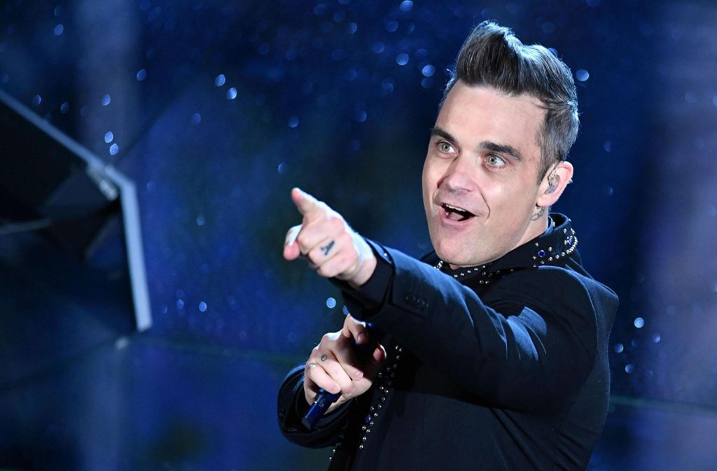 Ein bisschen grauer ist er geworden und fülliger auch, aber Robbie Williams ist immer noch ein begnadeter Entertainer.
