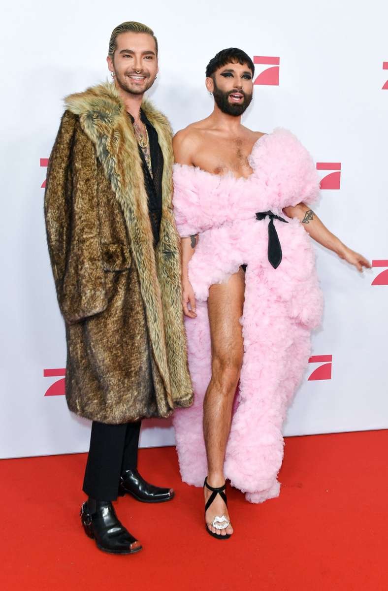 2019: Die Sänger Bill Kaulitz (links) und Conchita Wurst stehen bei der Premiere der neuen Show „Queen of Drags“ von ProSieben auf dem roten Teppich.