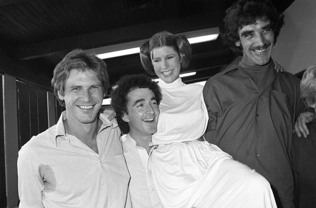 Stars-Wars-Dreharbeiten: Carrie Fisher mit Harrison Ford, Anthony Daniels und Peter Mayhew.