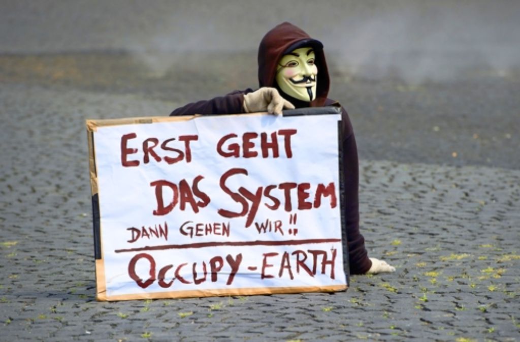 Auch das ist heue links: ein Occupy-Anhänger im Juli 2012 in Frankfurt Foto: dpa