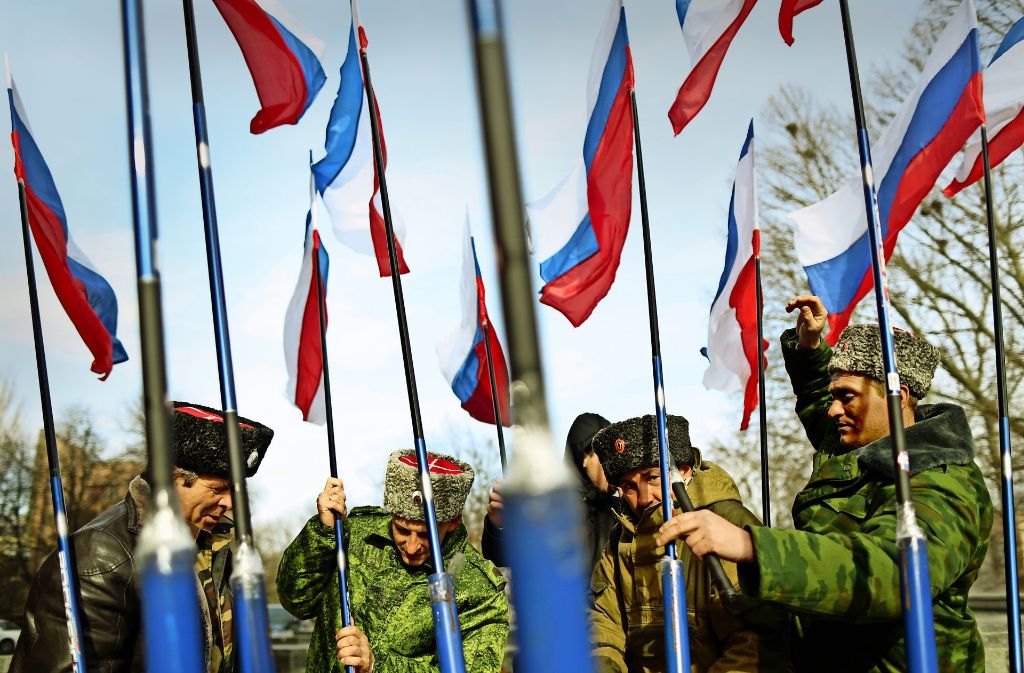 „Russia first“: Russische Soldaten feiern den Jahrestag der Besetzung der Krim Foto: AFP
