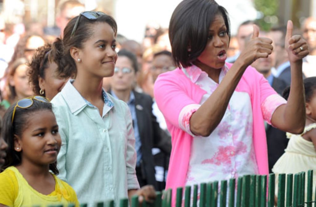 April 2010: Sasha (links), Malia und ihre Mutter Michelle beim traditionellen "Easter Egg Roll" im Garten des Weißen Hauses.