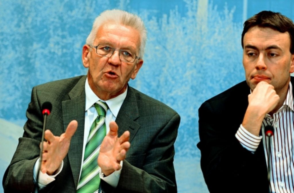 Nur bedingt zufrieden: die Regierungsspitzen Winfried Kretschmann (links), Nils Schmid Foto: dpa