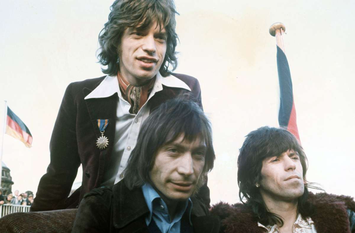 Mick Jagger, Charlie Watts und Keith Richards (v. li.) bei einer Pressekonferenz 1970 in Hamburg.