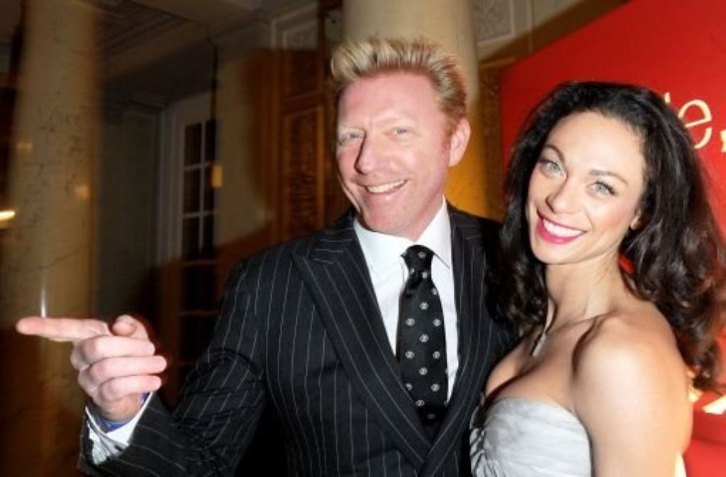 Boris Becker (hier mit seiner Frau) muss 800 000 Euro zahlen. Foto: dpa