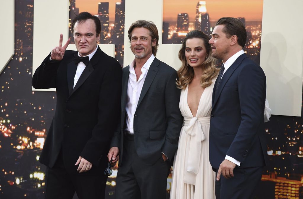 Quentin Tarantino zusammen mit seinen Hauptdarstellern Brad Pitt, Margot Robbie und Leonardo DiCaprio (v.l.)