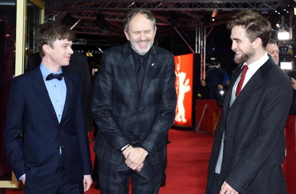 Robert Pattinson (r), der niederländische Fotograf und Regisseur Anton Corbijn (M) und US-Schauspieler Dane DeHaan.