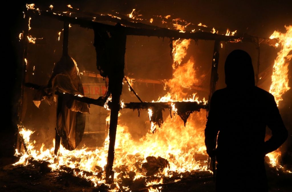 Im Flüchtlingscamp „Dschungel von Calais“ sind in der Nacht zum Mittwoch Gasflaschen explodiert. Foto: AFP