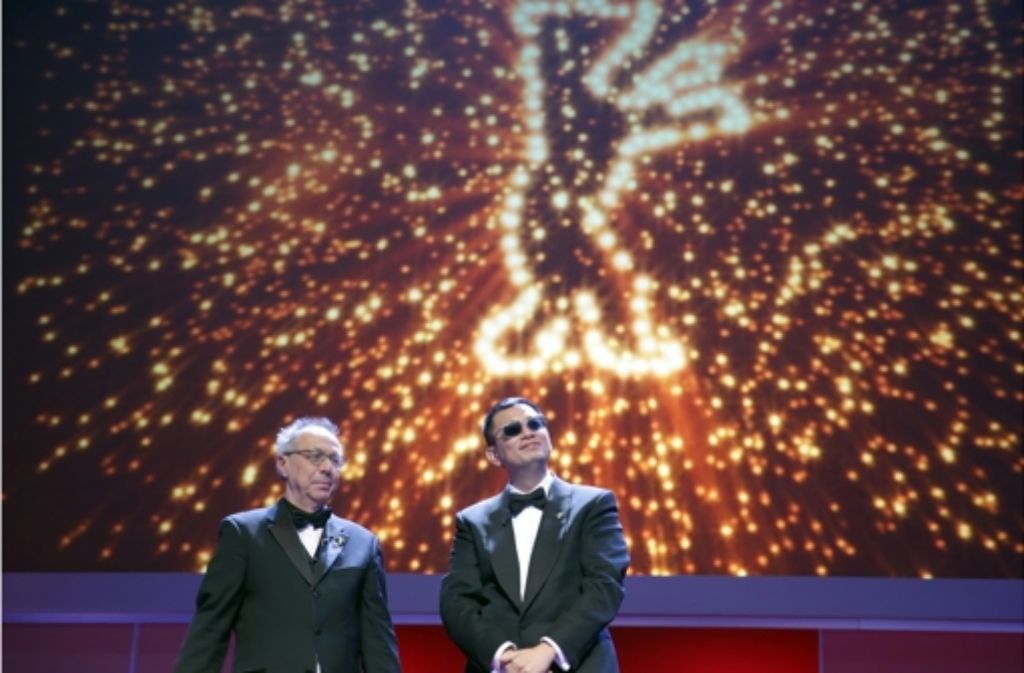Der Berlinale-Jurypräsident Wong Kar Wai (rechts) und Berlinale-Direktor Dieter Kosslick bei der Eröffnungsgala am Donnerstagabend