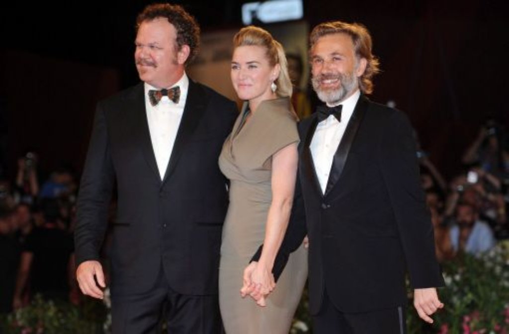 US-Schauspieler John C. Reilly (links), Kate Winslet (Mitte) and der österreichische Schauspieler Christoph Waltz