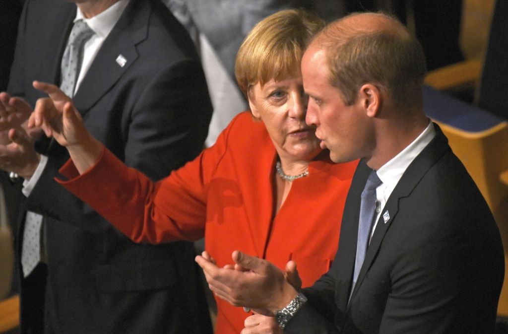 Merkel im Gespräch mit dem britischen Prinz William.