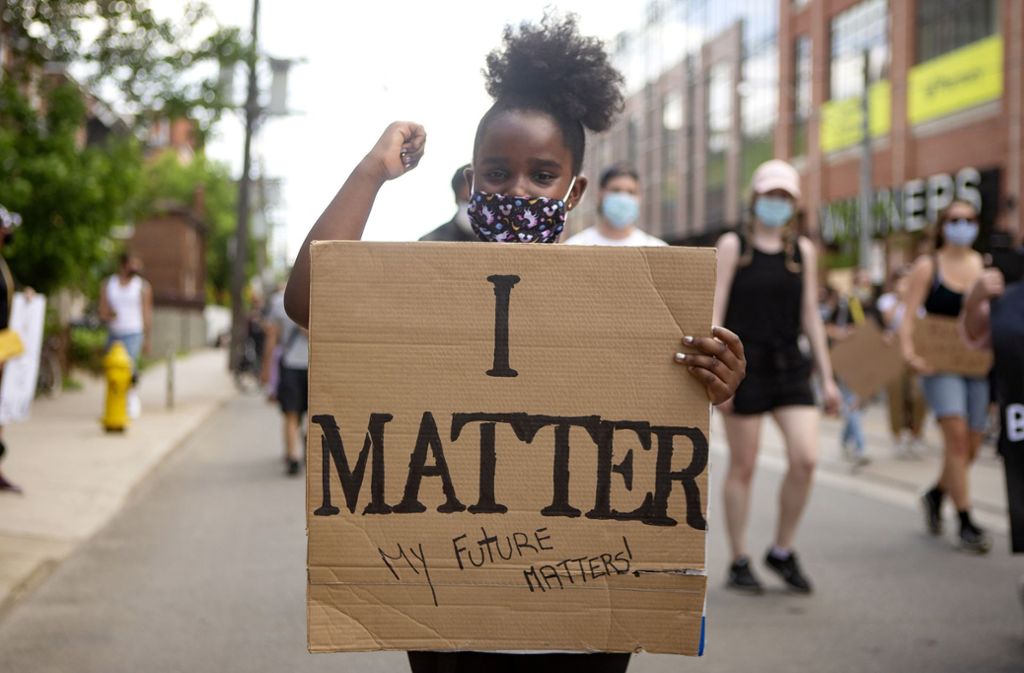 Eine 8-Jährige demonstrierte in Toronto (Kanada).