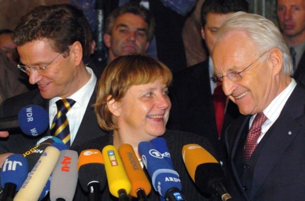 Knapp 20 Jahre später: Westerwelle zusammen mit der damaligen CDU-Vorsitzenden Angela Merkel und dem CSU-Vorsitzenden Edmund Stoiber.