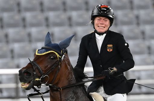 Bei den Olympischen Spielen in Tokio  hatte Annika Schleu für Aufsehen und scharfe Kritik gesorgt. Die Deutsche war  mit dem  ihr zugelosten  Pferd nicht zurechtgekommen. Foto: dpa/Marijan Murat