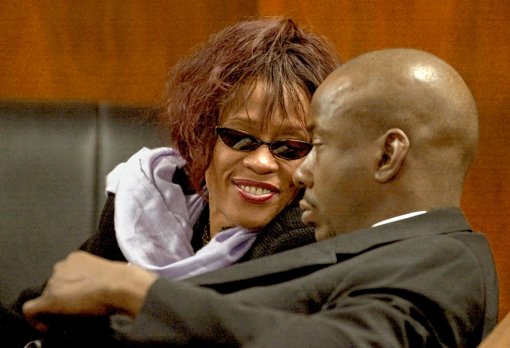Whitney Houston und ihr Mann Bobby Brown, Foto: AP