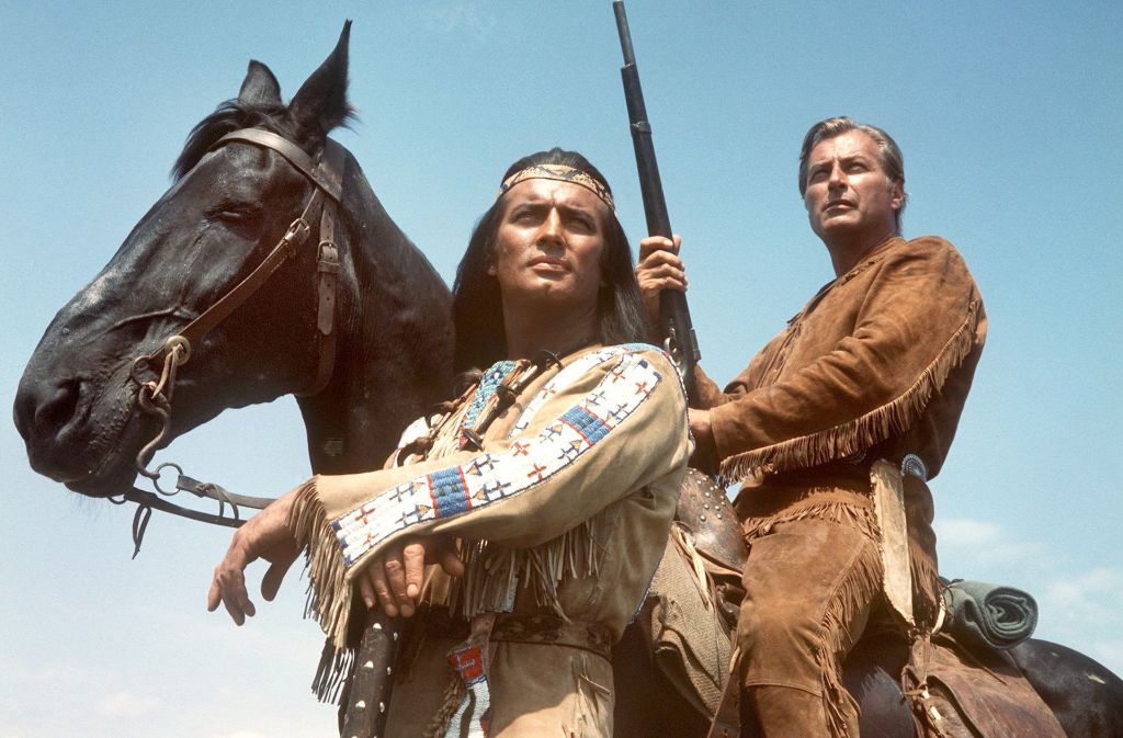 Männerfreunde: Winnetou (Pierre Brice) und Old Shatterhand (Lex Barker). Durch die elf Film-Adaptionen von Karl Mays frei erfundenen Western-Stoffen wurde „Wild, Wild West“ in den Herzen von Millionen Kindern und Erwachsenen fest verankert.