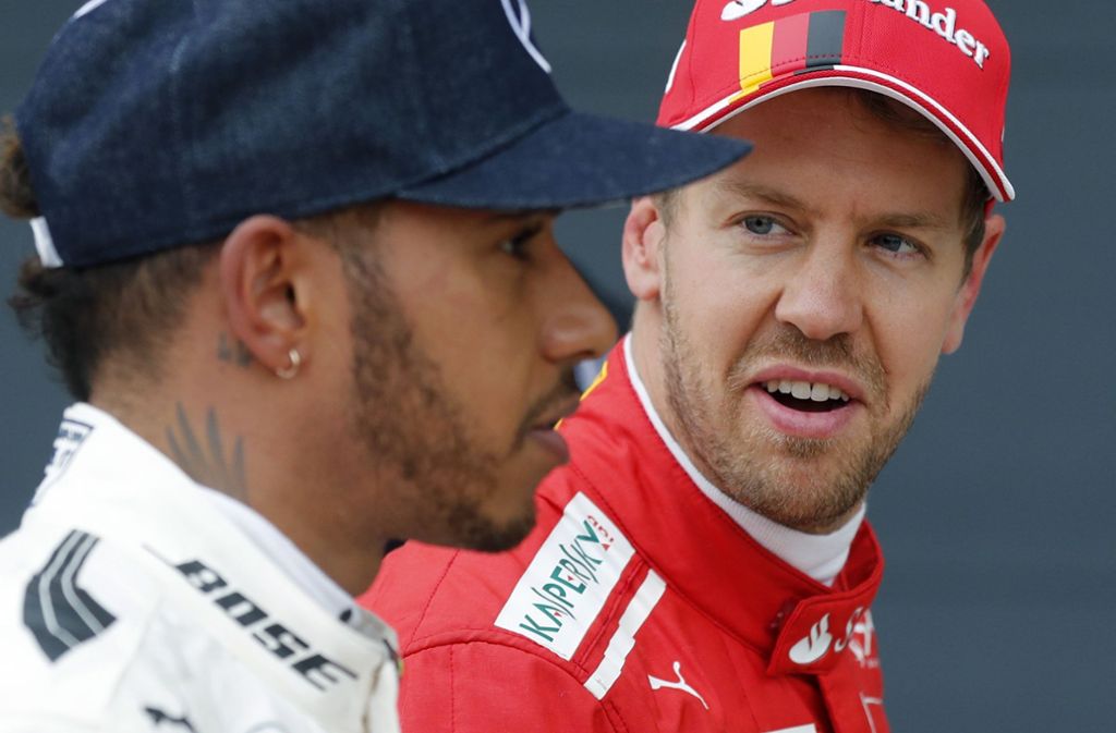 Die Rivalen der Rennbahn: Weltmeister Lewis Hamilton (li.) und Herausforderer Sebastian Vettel