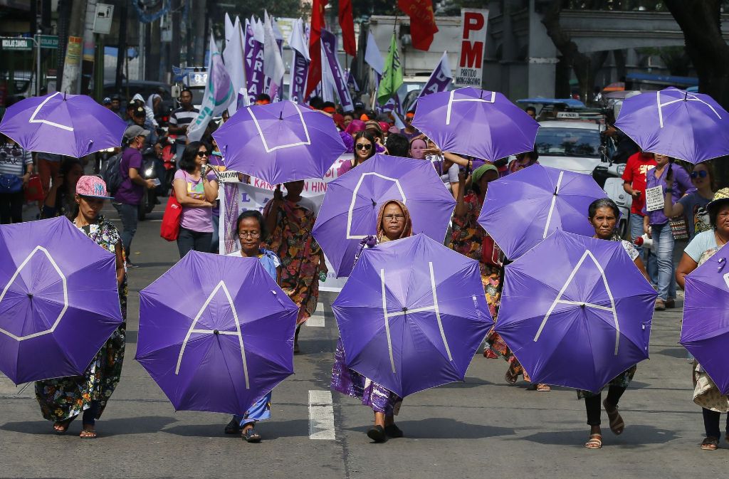 In Manila (Philippinen) demonstrieren Frauen am Internationalen Frauentag für die Rechte der Frauen in der philippinischen Gesellschaft.