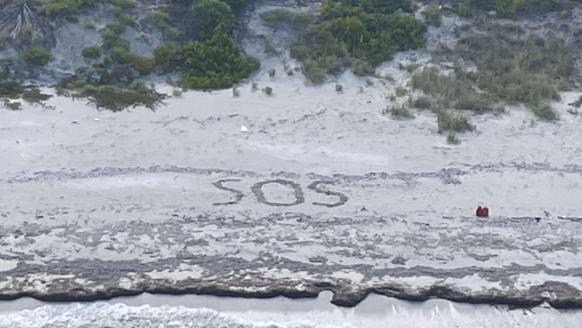 Auf Bahamas-Insel: Gestrandeter Deutscher schreibt „SOS“ in den Sand und wird gerettet