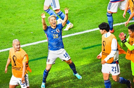 Takuma Asano bejubelt seinen Siegtreffer gegen Deutschland. Foto: AFP/Anne-Christine Poujoulat