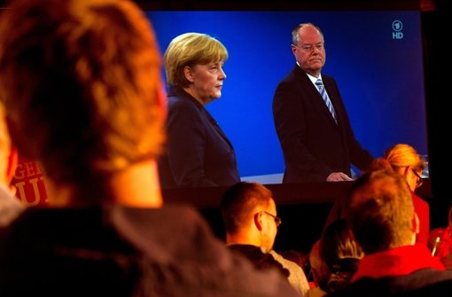 Angela Merkel und Peer Steinbrück im TV-Duell – und Deutschland schaut zu. Foto: dpa