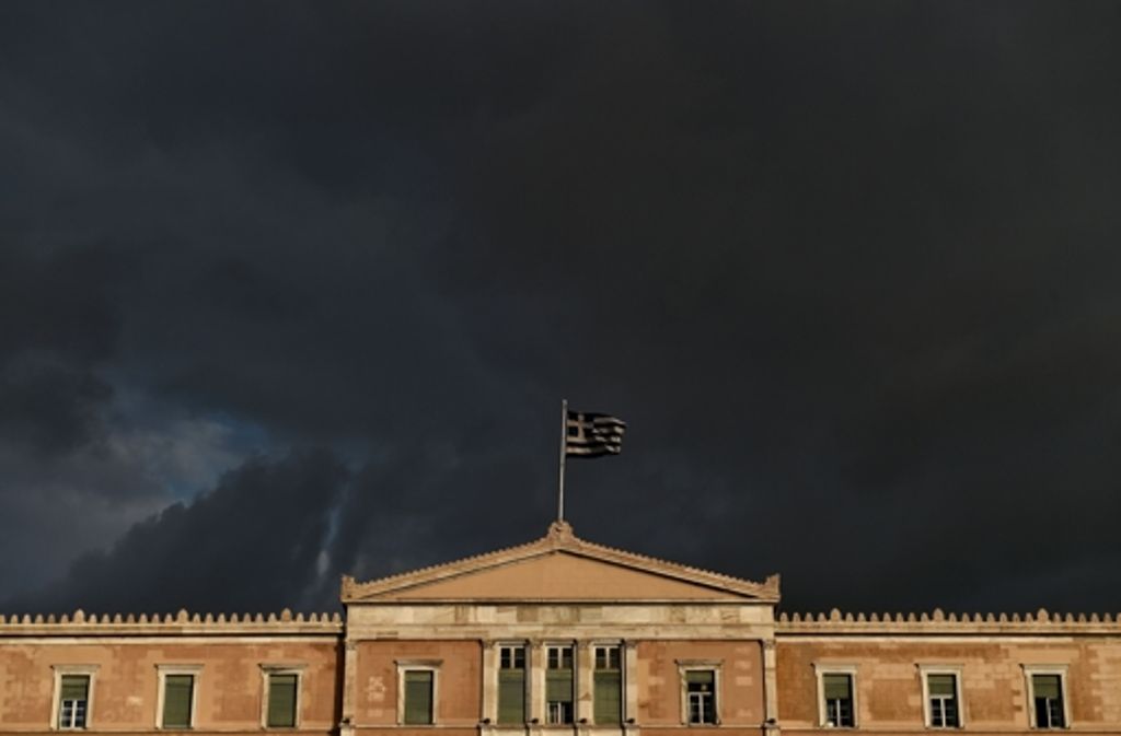 Dunkle Wolken über Athen – muss Griechenland die Eurozone verlassen? Foto: AFP