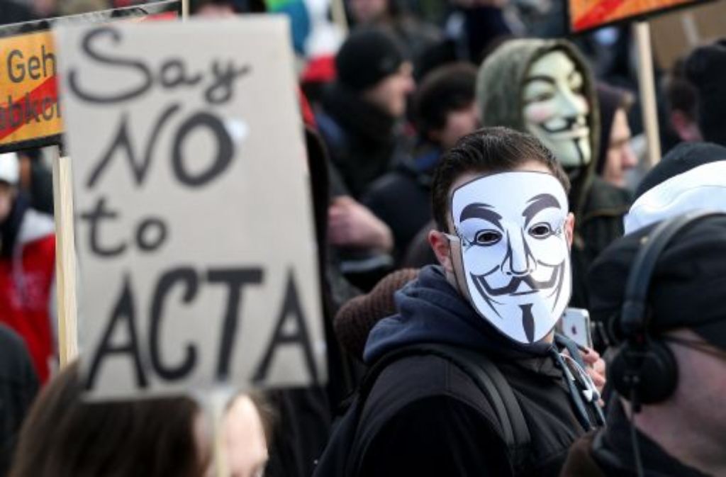 Demonstranten nutzen die Guy-Fawkes-Maske als Protestsymbol.