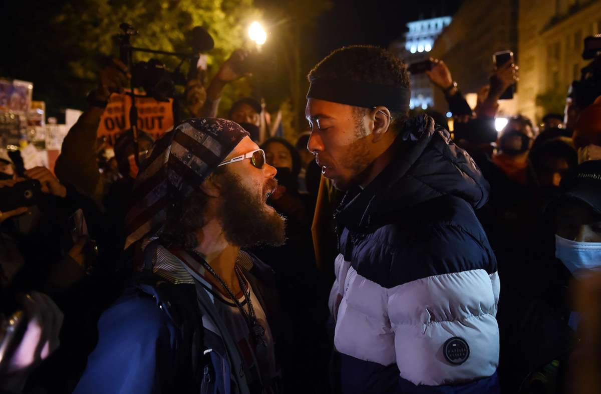 Ein Trump-Unterstützer beim Zusammentreffen mit einem Unterstützer der Black-Lives-Matter-Bewegung in Washington