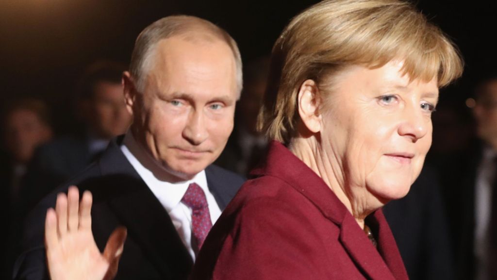 Kämpfe in der Ostukraine: Putin und Merkel fordern Feuerpause
