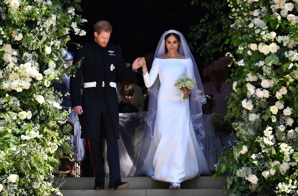 Der britische Prinz Harry und seine Frau Meghan verlassen nach ihrer Trauung am 19. Mai 2018 die St. George’S Chapel in Windsor.