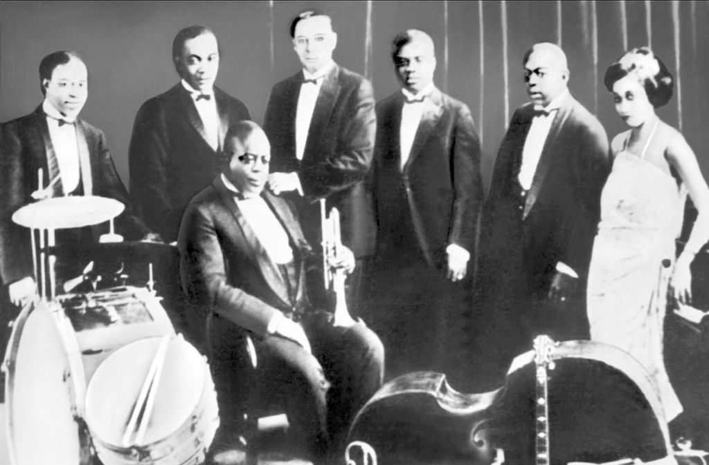 Joe King Oliver, Baby Dodds, Honore Dutrey, Bill Johnson, Louis Armstrong, Johnny Dodds und Lil Hardin Armstrong King Oliver als Creole Jazz Band