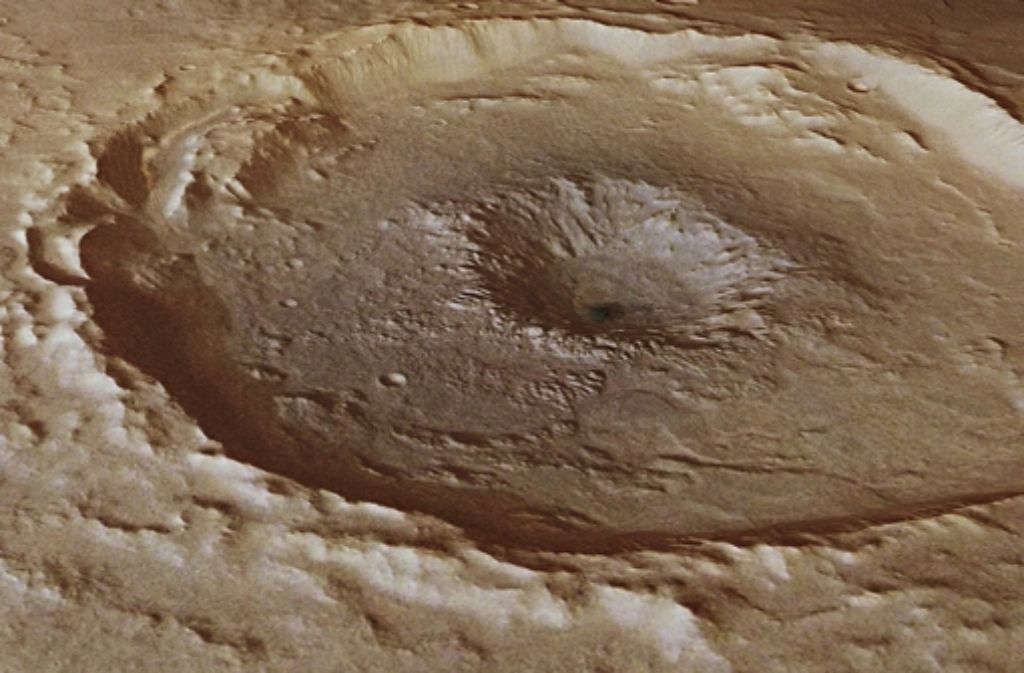 Kurioser Treffer Nummer 2: Ein Meteoritentreffer mitten in einen bereits existierenden Meteoritenkrater? So wird es nicht gewesen sein, sagen Esa-Forscher. Sie vermuten, dass sich der Krater im Krater anders gebildet hat. Nach dem Einschlag könnte Eis unter der Oberfläche erhitzt worden und schließlich explodiert sein.