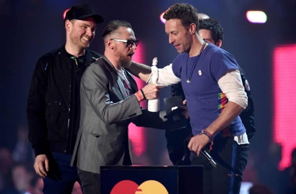 Ebenfalls nominiert sind Coldplay, hier bei den BritAwards 2016,...