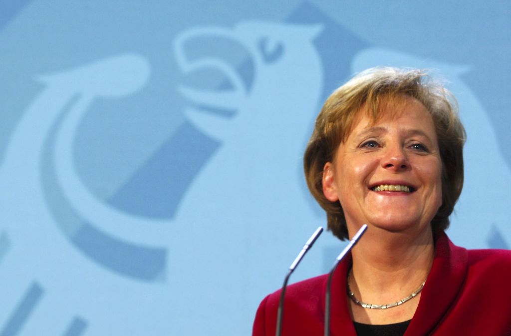 Die erste Bundeskanzlerin Deutschlands: Angela Merkel (CDU) trat am 22. November 2005 ihr Amt an und strahlte wenige Tage während einer Pressekonferenz im Bundeskanzleramt in Berlin.