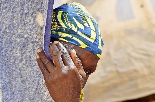 Gefangen in der Hölle der Erinnerung: eine Nigerianerin, die Boko Haram entkommen konnte. Fotos:AFP (2) Foto:  