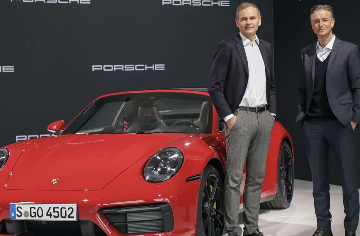Porsche-Chef Oliver Blume (links) und Finanzvorstand Lutz Meschke sehen sich auf ihrem Kurs bestätigt. Foto: Porsche