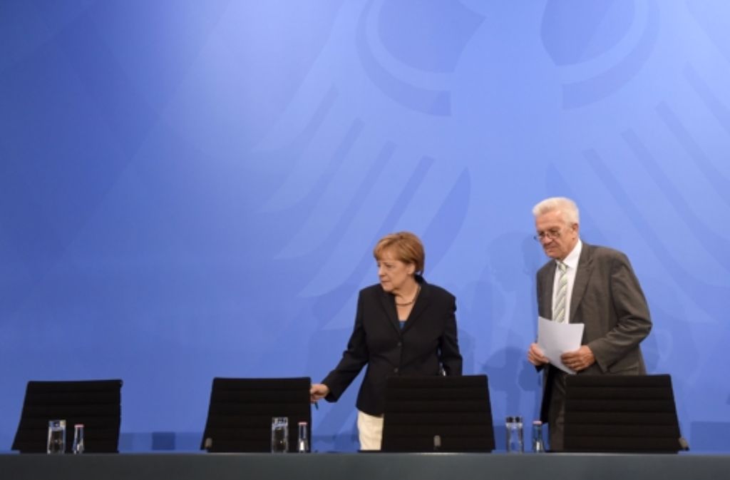 Bundeskanzlerin Angela Merkel und der Südwest-Ministerpräsident Winfried Kretschmann Foto: dpa