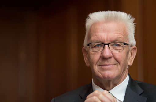 Kretschmann will Fahrverbote in Stuttgart verhindern. Foto: dpa