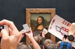 Besucher bewirft Vitrine der „Mona Lisa“  mit Torte