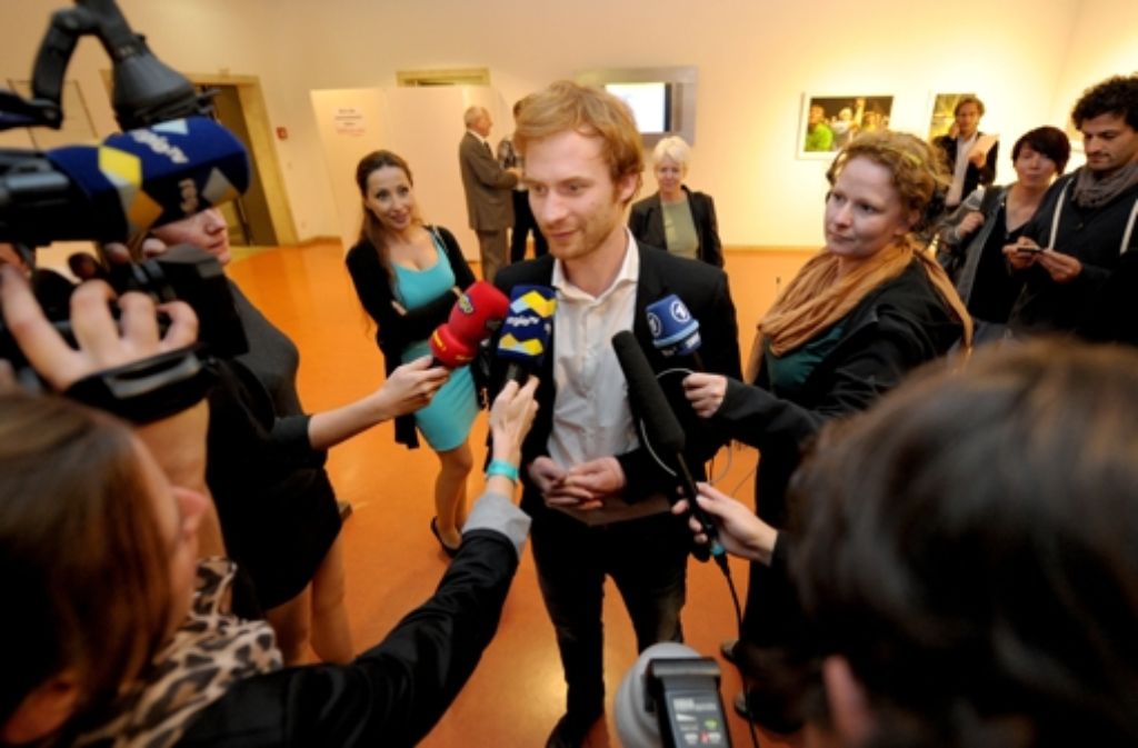 Hannes Rockenbauch (SÖS) ist mit dem Wahlergebnis ganz zufrieden. Foto: dpa